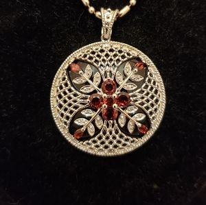 Art Deco style garnet, sterling silver, and onyx